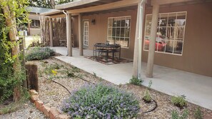 Casa Merlot patio w/ outdoor seating & table.
