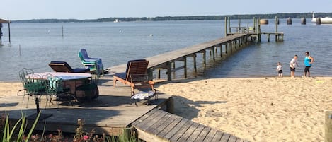 white sand beach with 180 foot pier and entry ramp.