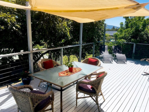 Sunny deck for entertaining or BBQs with views to Mt Gulaga.
