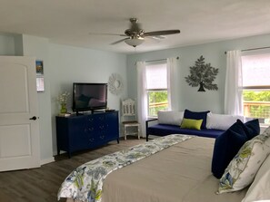 Upstairs- Private master  suite with private bath, walk-in closet and lake view.