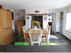 Cosy yet light and airy, the kitchen is the hub of this home