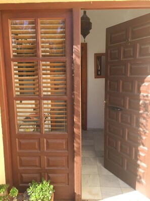 Three steps up to back door