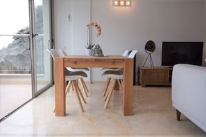 Solid Oak dining table and chairs