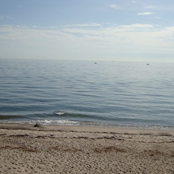 Your view! Step out onto a sandy beach a few feet to the water
