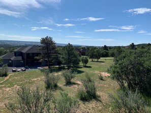 view from deck front of cottage/main house and toward black forest /Col Springs
