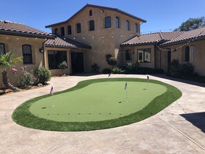 Courtyard putting green. 