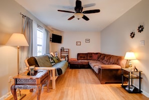 Cozy living area with futon bed for extra folks.