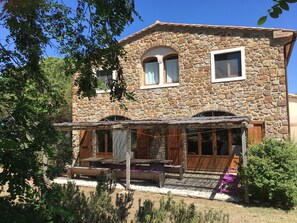 south patio: on the first floor the twin window is the main bathroom