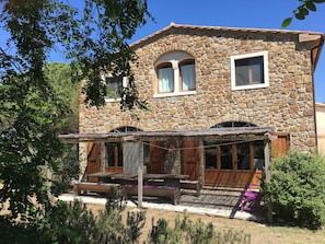 south patio: on the first floor the twin window is the main bathroom