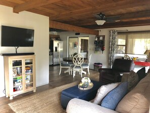 Open floor plans makes it great to be “in the middle” of the action.  42” TV with expanded cable, Roku, internet and WiFi. BOSE speaker for use with your music collection on your WiFi device. We have provided cards, puzzles and board games for you to enjoy. 