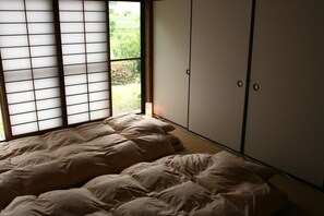 Traditional Japanese style that sleeping with the &#39;FUTON&#39; on straw matted called &#39;TATAMI&#39;