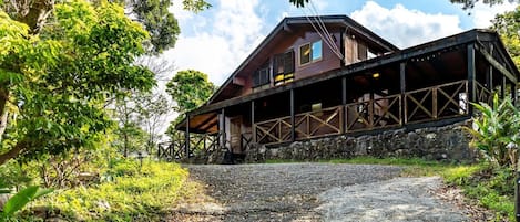 Half DIY-built wood cabin on the top of the hill