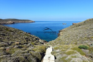 Private path leading to the small cove