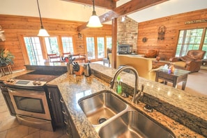 Kitchen - Main Level - Kitchen with full sink and oven.