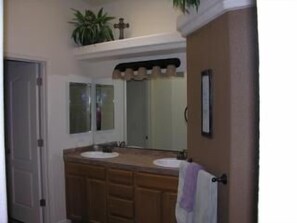 Master bathroom with walkin shower and closet