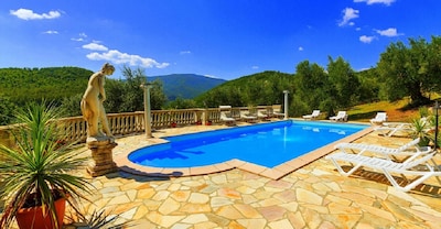 Appartement Leonardo avec vue sur le lieu de naissance et le château de Michel-Ange en Toscane