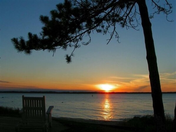 Enjoy Striking Views of the Water and Beach & Sunsets from the back yard