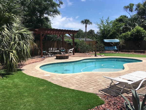 AstroTurf surrounding pool patio