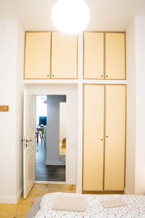 Bedroom1: The apricot and oak wardrobe