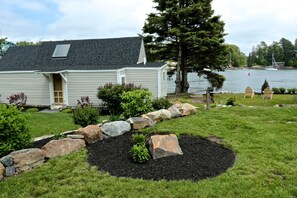 Front of cottage from parking spot. 
