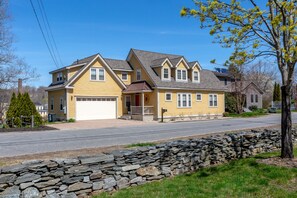 Street view, with ample parking for 3 cars and full use of the garage.