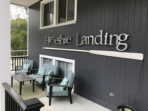 Front of the house with covered porch. A great place to sit & watch kids playing