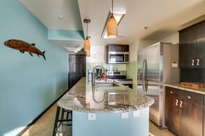 Renovated & upgraded gourmet kitchen with granite counters & stainless appliance