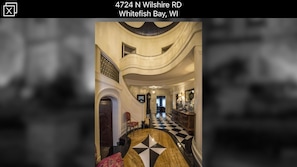 Foyer with winding staircase