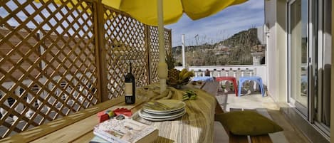 Katoi Apartment  1 in Agios  Georgios  Pagoi outdoor dining area