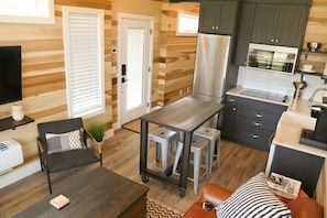 The open floor plan makes the kitchen feel larger and more inviting.