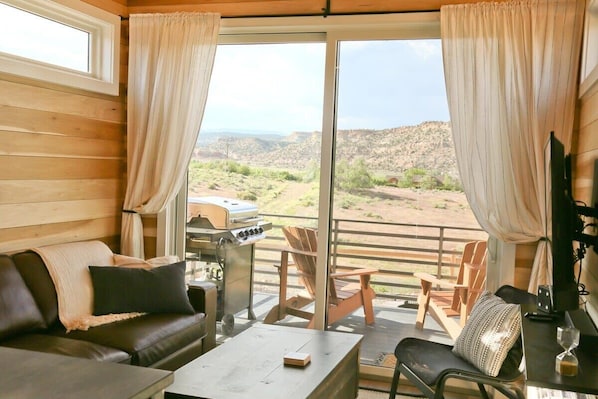 Your southern Utah vacation will be filled with magical moments when you stay at Moon Lily, Escalante Escapes! This luxury tiny home offers 2 bedrooms, sleeps up to 6, and is located only minutes from Grand Staircase-Escalante National Monument.