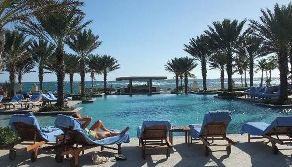 Relaxing by the pool, enjoying the sunshine and warm Caribbean breeze