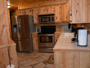 Fully Stocked Stainless Steel Kitchen (including dishwasher)