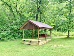 New 10x16 shelter with swing & bench for relaxing in the backyard. 