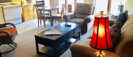 living room and dining table that overlooks historical Main Street