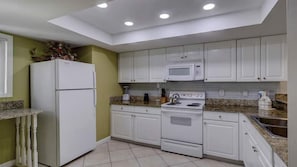 Fully Equipped Kitchen With Granite Countertops *The unit shown is representative of similar units