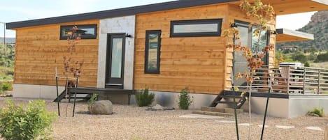 Prickly Pear at Escalante Escapes is your tiny home desert oasis! With 400 sq ft and 2 BR, you can sleep up to 6. It’s full of amenities and makes the perfect home base for southern Utah hiking adventures - just 15 minutes from the Grand Staircase.