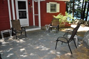 Front entrance with stone patio