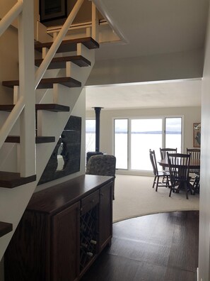 View from the front entrance through the living room to the lake.