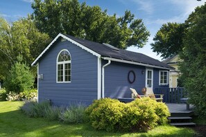 The Cottage tiny house with a private deck