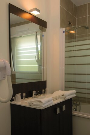 Get ready for your day in the lovely bathroom.