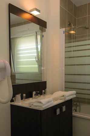 Get ready for your day in the lovely bathroom.
