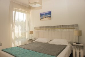 The master bedroom features a Double bed.