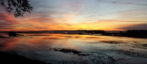 Spectacular sunrises and panoramic marsh views!