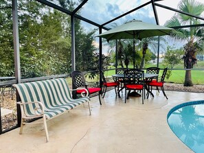 Extra seating and view of spacious back yard.