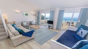Beach themed lounge with views overlooking the beach