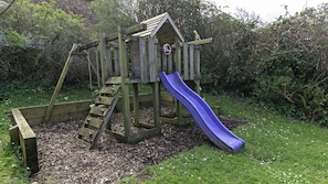 Adventure play area slide and climbing frame