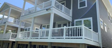 Large rear decks seating 13 on lower deck with Weber grill. Great for families!