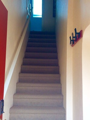 Private outside entrance with stairway up to fun apartment 
