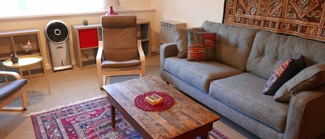 Bright Eclectic living room with all new furnishings